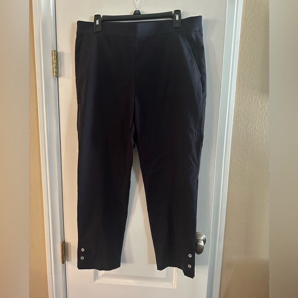 Women’s Navy Pants with pockets and cute buttons on bottom of legs. Large